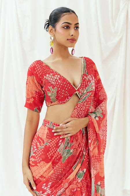 Redpine Designs Red Viscose Georgette Sequins V-neck Printed Pre-draped Saree With Blouse at Aza Fashions Redpine Designs_Red Viscose Georgette Sequins V-neck Printed Pre-draped Saree With Blouse _at_Aza_Fashions