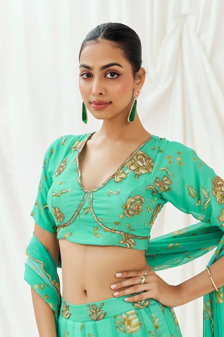 Buy_Redpine Designs_Turquoise Viscose Georgette Sequins, Embroidery, Tassels Printed Lehenga Set 