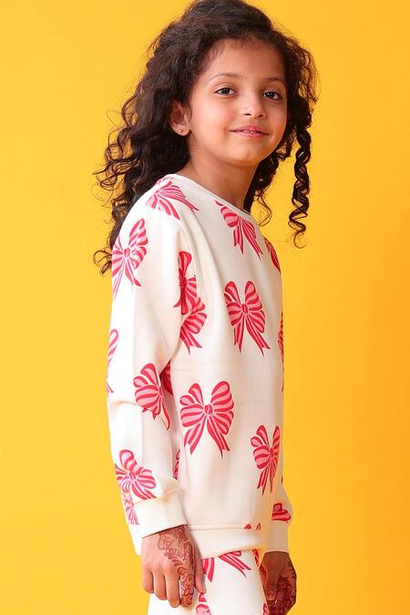 Anthrilo_White Fleece Bow Pattern Sweatshirt And Joggers Set_at_Aza_Fashions