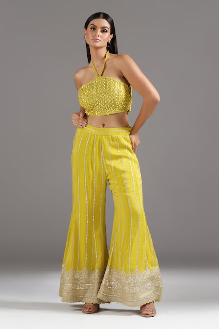 Buy_Two Sisters By Gyans_Yellow Silk Sequins, Zari Halter Neck Embroidered Blouse With Sharara _Online_at_Aza_Fashions