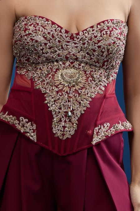 Tarun Tahiliani Wine Sweetheart Neck Embroidered Corset And Trouser Set at Aza Fashions Tarun Tahiliani_Wine Sweetheart Neck Embroidered Corset And Trouser Set_at_Aza_Fashions
