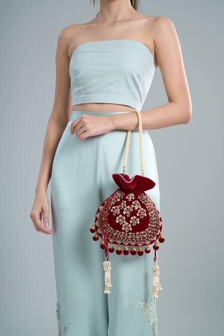 Nazaakat By Samara Singh Maroon Embroidery, Tassels Hand Potli Bag at Aza Fashions Nazaakat By Samara Singh_Maroon Embroidery, Tassels Hand Potli Bag _at_Aza_Fashions