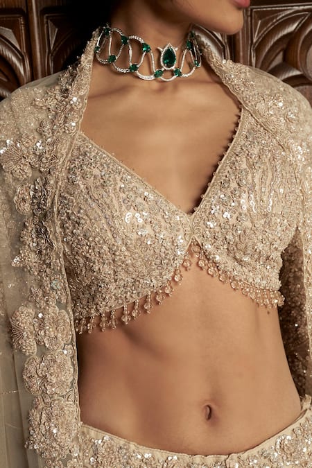 Istya Beige Net Sequins, Beads Round Neck Embellished Lehenga Set at Aza Fashions Istya_Beige Net Sequins, Beads Round Neck Embellished Lehenga Set _at_Aza_Fashions