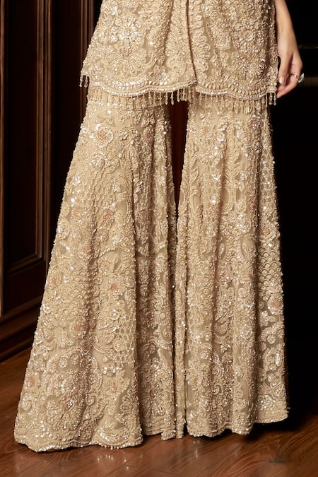 Shop_Istya_Beige Net Sequins, Embroidery V-neck Embellished Kurta Sharara Set _Online_at_Aza_Fashions