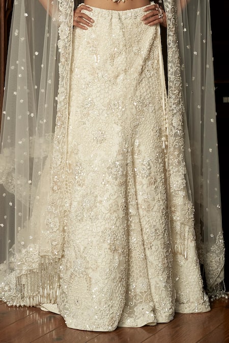 Shop_Istya_Ivory Net Sequins, Embroidery Embellished Fish Cut Lehenga Set _Online_at_Aza_Fashions