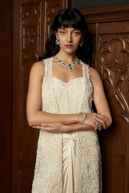 Shop_Istya_Ivory Net, Satin Sequins, Beads, Pearls Embellished Jacket And Draped Skirt Set _Online_at_Aza_Fashions