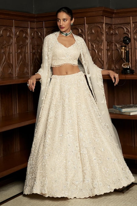 Istya Ivory Net Sequins, Pearls, Beads, Embroidery Sweetheart Embellished Lehenga Set 