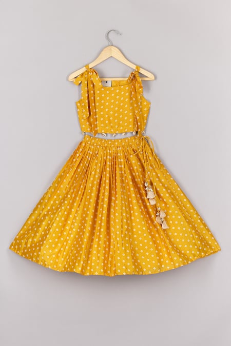 P & S CO Yellow Chanderi Tassels Bandhej Pattern Blouse With Lehenga