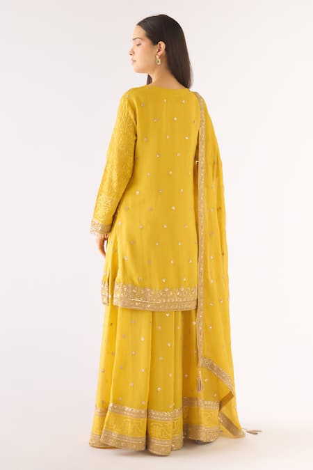 Shop Basanti - Kapde Aur Koffee Yellow Brocade Sequins, Zari, Embroidery Round Neck Banarasi Sharara Set at Aza Fashions Shop_Basanti - Kapde Aur Koffee_Yellow Brocade Sequins, Zari, Embroidery Round Neck Banarasi Sharara Set_at_Aza_Fashions