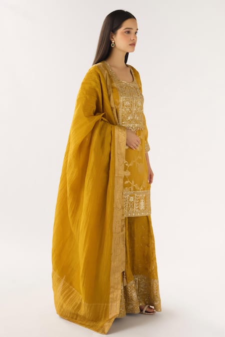 Basanti - Kapde Aur Koffee Mustard Brocade Zari, Sequins, Embroidery Round Neck Banarasi Sharara Set Online at Aza Fashions Basanti - Kapde Aur Koffee_Mustard Brocade Zari, Sequins, Embroidery Round Neck Banarasi Sharara Set_Online_at_Aza_Fashions