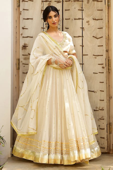 Sanam_Ivory Chanderi Mirrors, Zari, Gota Patti V-neck Embroidered Lehenga Set _Online_at_Aza_Fashions