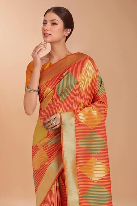 Shop_Samyukta Singhania_Orange Tassels V-neck Zari Woven Banarasi Silk Saree With Blouse _Online_at_Aza_Fashions