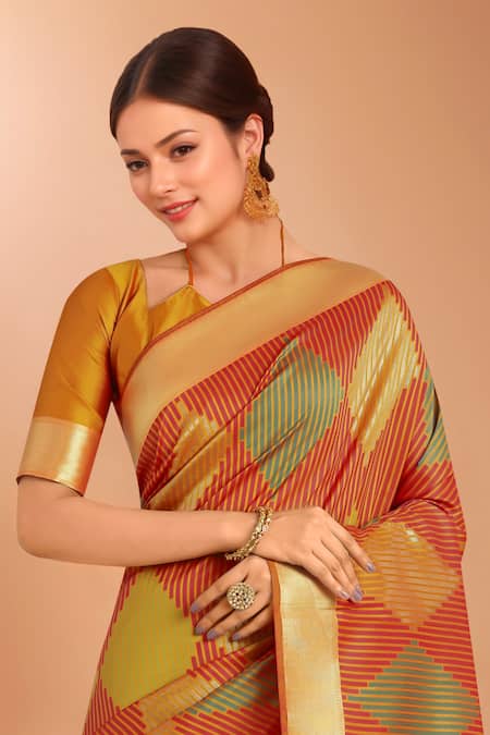 Samyukta Singhania_Orange Tassels V-neck Zari Woven Banarasi Silk Saree With Blouse _at_Aza_Fashions