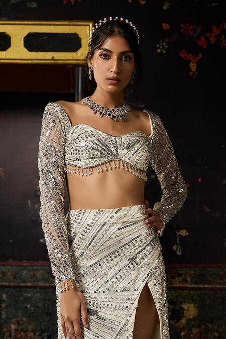 Diyarajvvir Ivory Tulle, Satin, Lycra Sequins, Beads, Embelllished Blose With Slit Skirt Online at Aza Fashions Diyarajvvir_Ivory Tulle, Satin, Lycra Sequins, Beads, Embelllished Blose With Slit Skirt _Online_at_Aza_Fashions