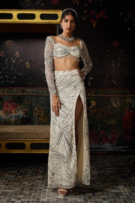 Buy Diyarajvvir Ivory Tulle, Satin, Lycra Sequins, Beads, Embelllished Blose With Slit Skirt Online at Aza Fashions Buy_Diyarajvvir_Ivory Tulle, Satin, Lycra Sequins, Beads, Embelllished Blose With Slit Skirt _Online_at_Aza_Fashions