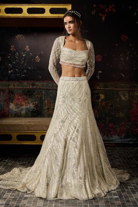 Buy Diyarajvvir Silver Tulle Beads, Sequins Square Neck Embellished Blouse With Lehenga Skirt Online at Aza Fashions Buy_Diyarajvvir_Silver Tulle Beads, Sequins Square Neck Embellished Blouse With Lehenga Skirt _Online_at_Aza_Fashions