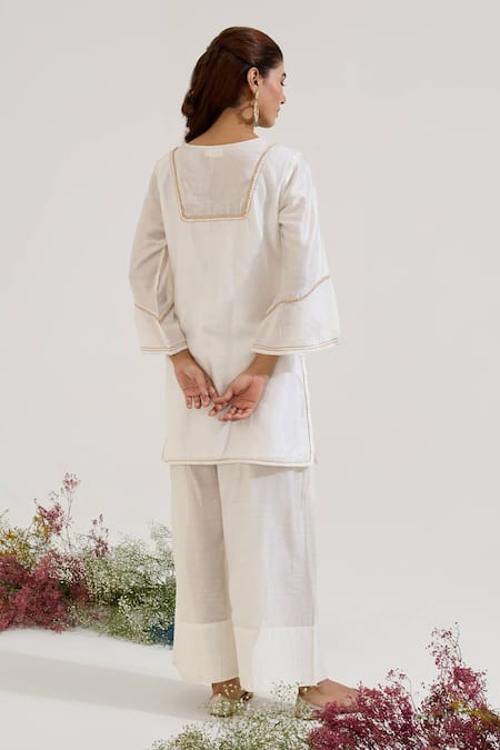 Shop Nero India White Chanderi Embroidery, Tassels Keyhole Neck Floral Kurta Set at Aza Fashions Shop_Nero India_White Chanderi Embroidery, Tassels Keyhole Neck Floral Kurta Set _at_Aza_Fashions