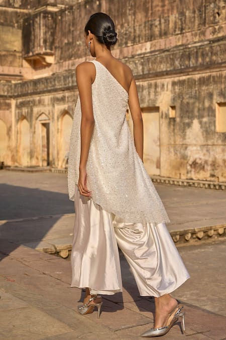 Shop Dash And Dot Ivory Polyester Embroidery One Shoulder Pearl Top With Culottes at Aza Fashions Shop_Dash And Dot_Ivory Polyester Embroidery One Shoulder Pearl Top With Culottes _at_Aza_Fashions