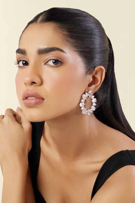 Shop Isharya White Crystals Eternal Glow Circle Rhodium Plated Hoops Online at Aza Fashions Shop_Isharya_White Crystals Eternal Glow Circle Rhodium Plated Hoops_Online_at_Aza_Fashions