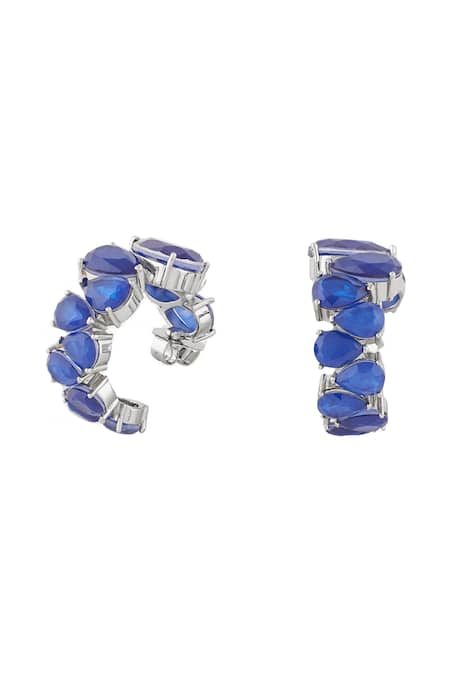 Shop Isharya Blue Stones Sapphire Glow Statement Rhodium Plated Hoops at Aza Fashions Shop_Isharya_Blue Stones Sapphire Glow Statement Rhodium Plated Hoops _at_Aza_Fashions