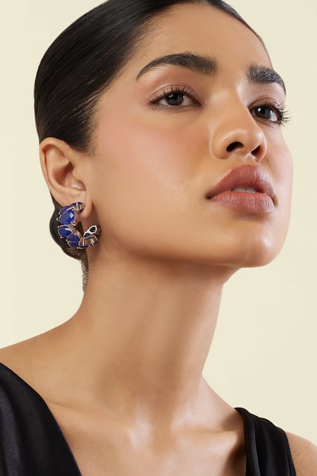 Buy Isharya Blue Stones Sapphire Glow Statement Rhodium Plated Hoops Online at Aza Fashions Buy_Isharya_Blue Stones Sapphire Glow Statement Rhodium Plated Hoops _Online_at_Aza_Fashions