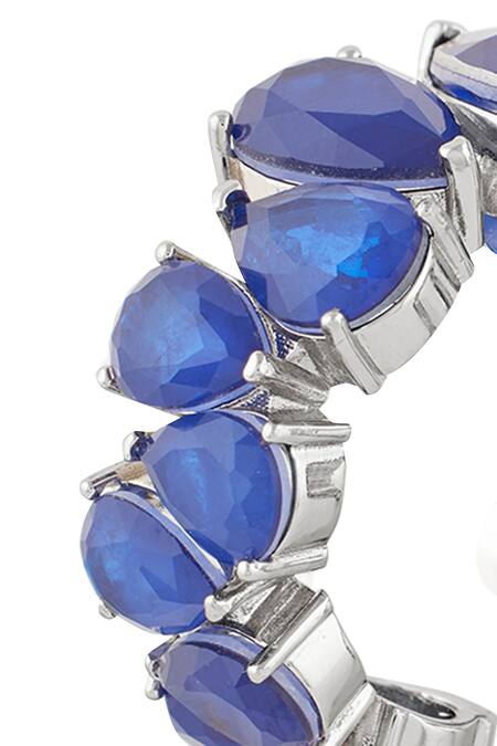 Shop Isharya Blue Stones Sapphire Glow Statement Rhodium Plated Hoops Online at Aza Fashions Shop_Isharya_Blue Stones Sapphire Glow Statement Rhodium Plated Hoops _Online_at_Aza_Fashions