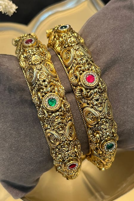 Shop_Prestones_Red Imitation Gemstones Temple Carved Bangles - Set Of 2 _Online_at_Aza_Fashions