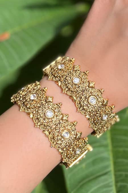 Prestones_Gold Plated Crystals Temple Broad Bangles - Set Of 2_Online_at_Aza_Fashions