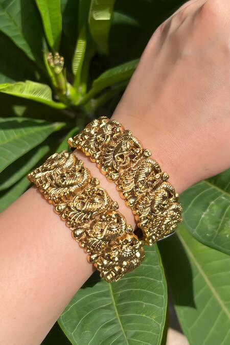 Prestones_Gold Plated Temple Motif Bangles - Set Of 2_at_Aza_Fashions