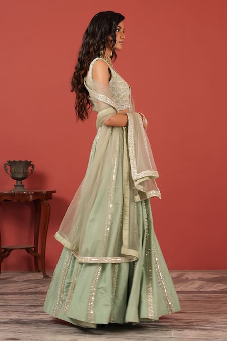 Suruchi Parakh_Ivory Tissue, Net Embroidery, Sequins V-neck Blouse Skirt Set _Online_at_Aza_Fashions