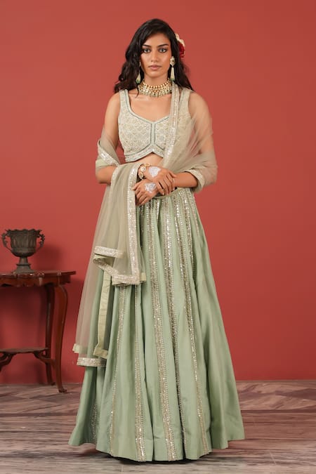 Suruchi Parakh_Ivory Tissue, Net Embroidery, Sequins V-neck Blouse Skirt Set _at_Aza_Fashions