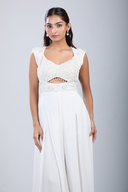 Samyukta Singhania_White Chinon Sequins, Embroidery Scoop Neck Embellished Cutwork Jumpsuit _at_Aza_Fashions