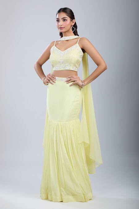 Samyukta Singhania_Yellow Chinon Sequins, Embroidery V-neck Embellished Blouse And Skirt Set _at_Aza_Fashions