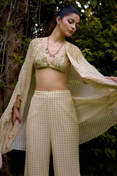 Nikasha Cream Silk Sequins Round , Scoop Janeman Floral Print Cape Pant Set Online at Aza Fashions Nikasha_Cream Silk Sequins Round , Scoop Janeman Floral Print Cape Pant Set _Online_at_Aza_Fashions