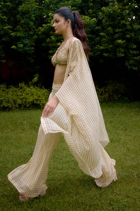 Buy Nikasha Cream Silk Sequins Round , Scoop Janeman Floral Print Cape Pant Set Online at Aza Fashions Buy_Nikasha_Cream Silk Sequins Round , Scoop Janeman Floral Print Cape Pant Set _Online_at_Aza_Fashions