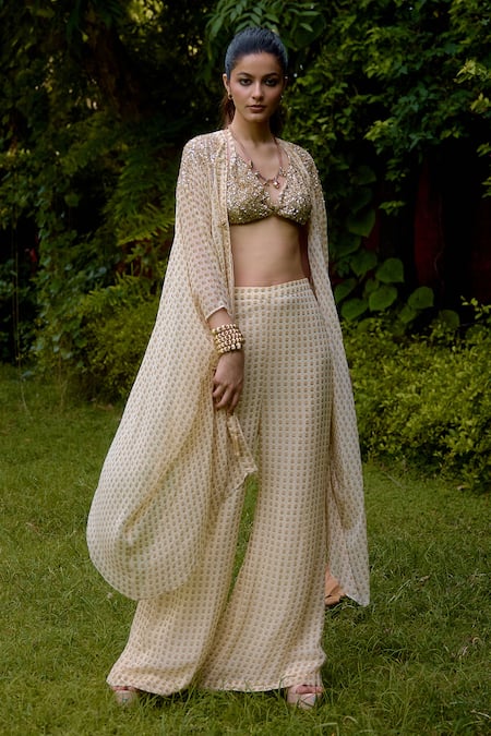 Shop Nikasha Cream Silk Sequins Round , Scoop Janeman Floral Print Cape Pant Set Online at Aza Fashions Shop_Nikasha_Cream Silk Sequins Round , Scoop Janeman Floral Print Cape Pant Set _Online_at_Aza_Fashions
