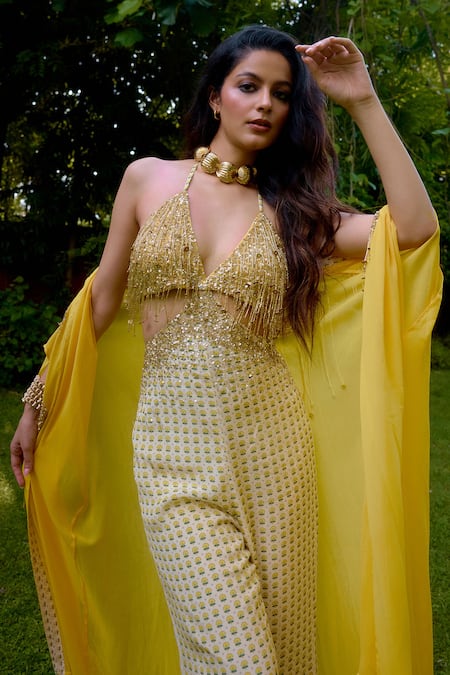 Buy_Nikasha_Cream Silk Beads, Sequins Halter Neck, Janeman Floral Print Jumpsuit With Cape _Online_at_Aza_Fashions