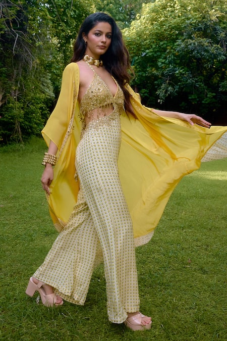 Shop_Nikasha_Cream Silk Beads, Sequins Halter Neck, Janeman Floral Print Jumpsuit With Cape _Online_at_Aza_Fashions