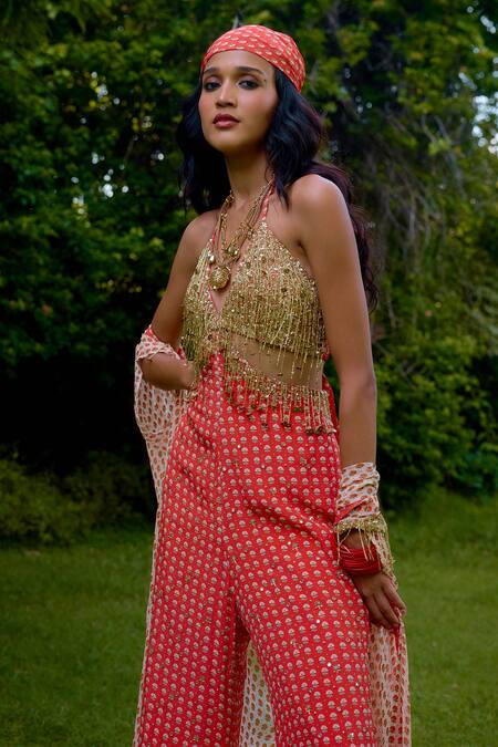 Shop_Nikasha_Coral Silk Beads Halter , Open Janeman Embellished Jumpsuit With Cape _Online_at_Aza_Fashions