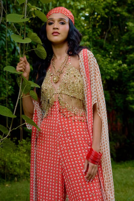 Nikasha_Coral Silk Beads Halter , Open Janeman Embellished Jumpsuit With Cape _at_Aza_Fashions