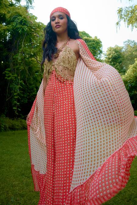 Shop_Nikasha_Coral Silk Beads Halter , Open Janeman Embellished Jumpsuit With Cape 