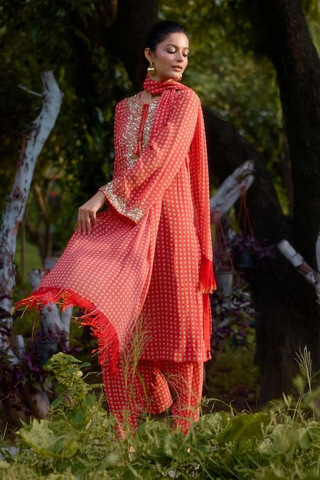 Shop Nikasha Coral Georgette Sequins, Embroidery, Tassels Dilruba Flower Print Kurta Set at Aza Fashions Shop_Nikasha_Coral Georgette Sequins, Embroidery, Tassels Dilruba Flower Print Kurta Set _at_Aza_Fashions