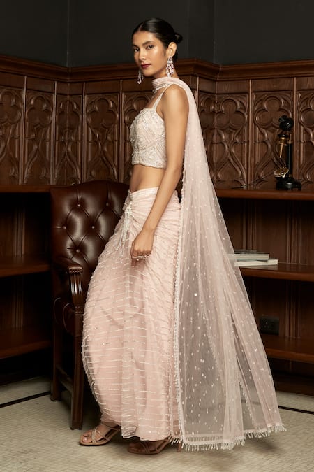 Istya Pink Net Sequins, Beads, Embroidery Square Neck Blouse Draped Skirt Set at Aza Fashions Istya_Pink Net Sequins, Beads, Embroidery Square Neck Blouse Draped Skirt Set _at_Aza_Fashions