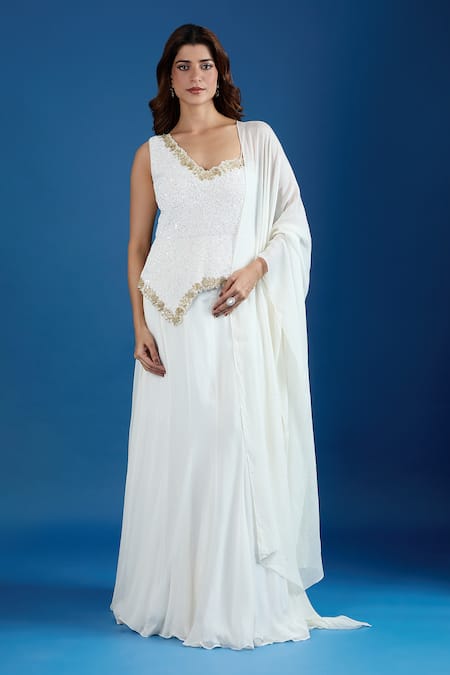 Shop_Samyukta Singhania_White Chinon Sequins Asymmetric Embroidered Blouse And Skirt Set _Online_at_Aza_Fashions
