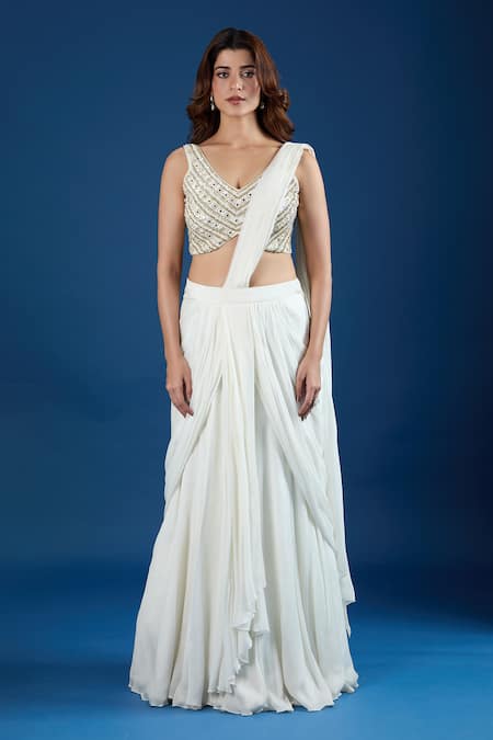 Samyukta Singhania_Ivory Chinon Embroidery, Mirrors V-neck Blouse With Pre-draped Saree _at_Aza_Fashions