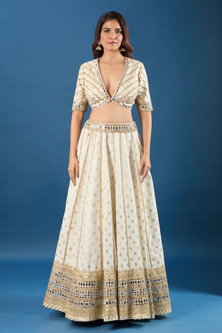 Samyukta Singhania Off White Brocade, Net Mirrors, Sequins V-neck Work Lehenga Set Online at Aza Fashions Samyukta Singhania_Off White Brocade, Net Mirrors, Sequins V-neck Work Lehenga Set _Online_at_Aza_Fashions