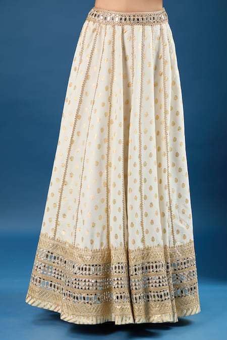 Shop Samyukta Singhania Off White Brocade, Net Mirrors, Sequins V-neck Work Lehenga Set Online at Aza Fashions Shop_Samyukta Singhania_Off White Brocade, Net Mirrors, Sequins V-neck Work Lehenga Set _Online_at_Aza_Fashions