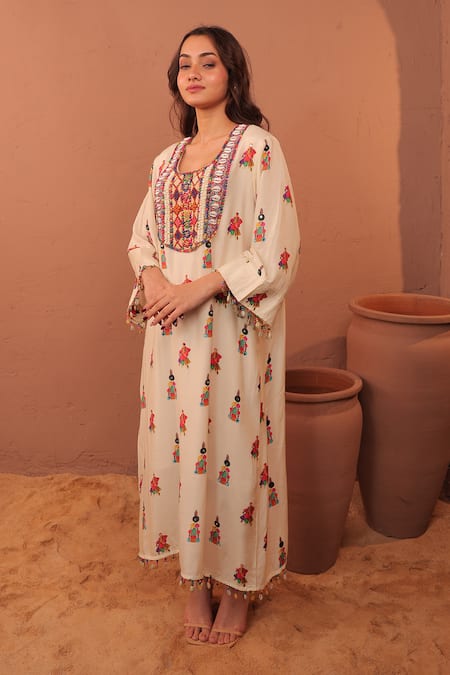 Buy_Surkh Syahi_Off White Cotton, Muslin Beads, Sequins Round Neck Albeli Tassel Bordered Dress _Online_at_Aza_Fashions