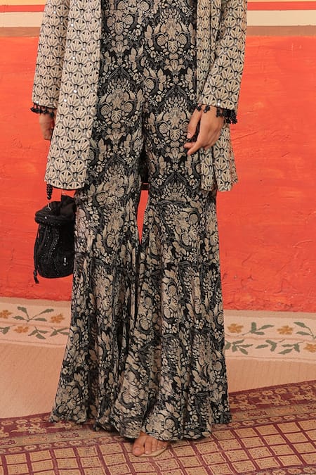 Surkh Syahi_Black Crepe Sequins Sweetheart Neck Pandora Gharara Set _at_Aza_Fashions