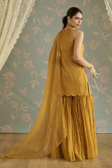 Kritika Dawar Ira Mustard Hand Embroidered Halter Neck Gharara Set 